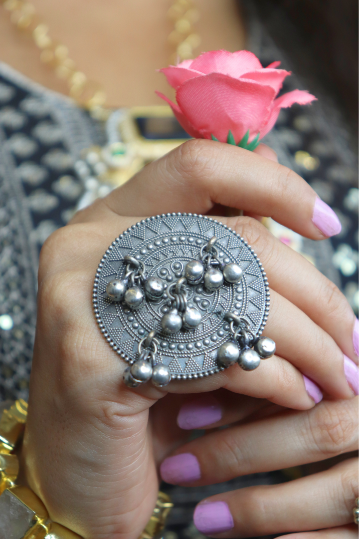 Silver ring with dangling beads