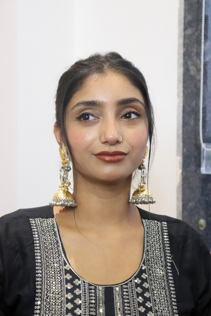 Woman wearing traditional earrings