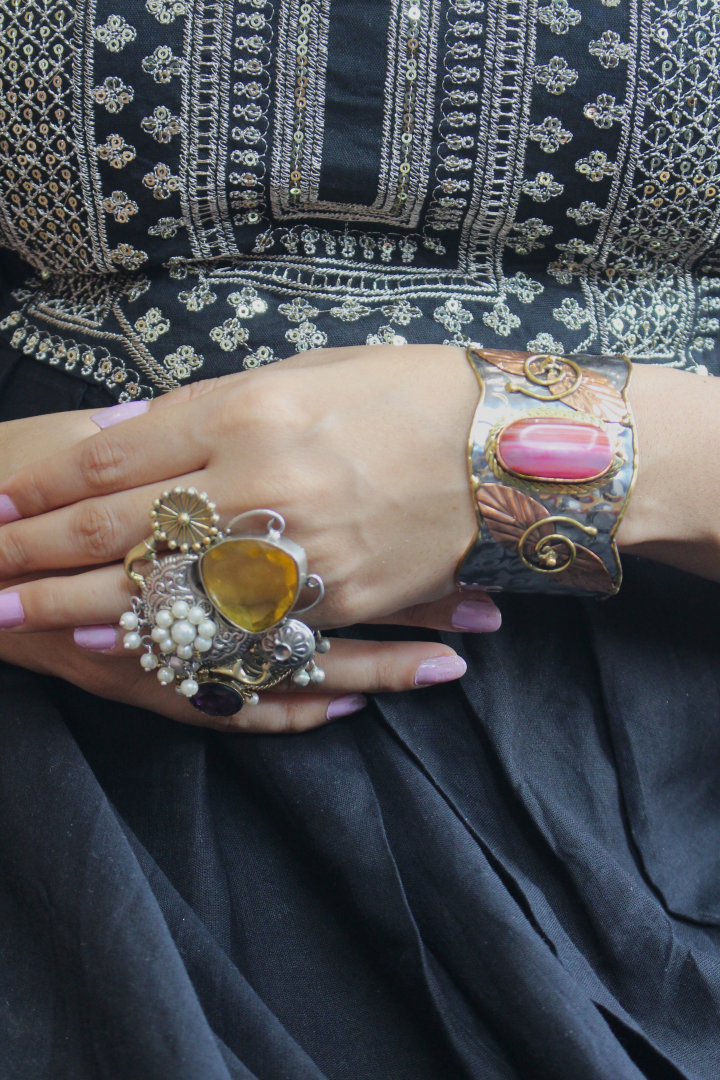 Close-up of women wearing ornate jewelry 