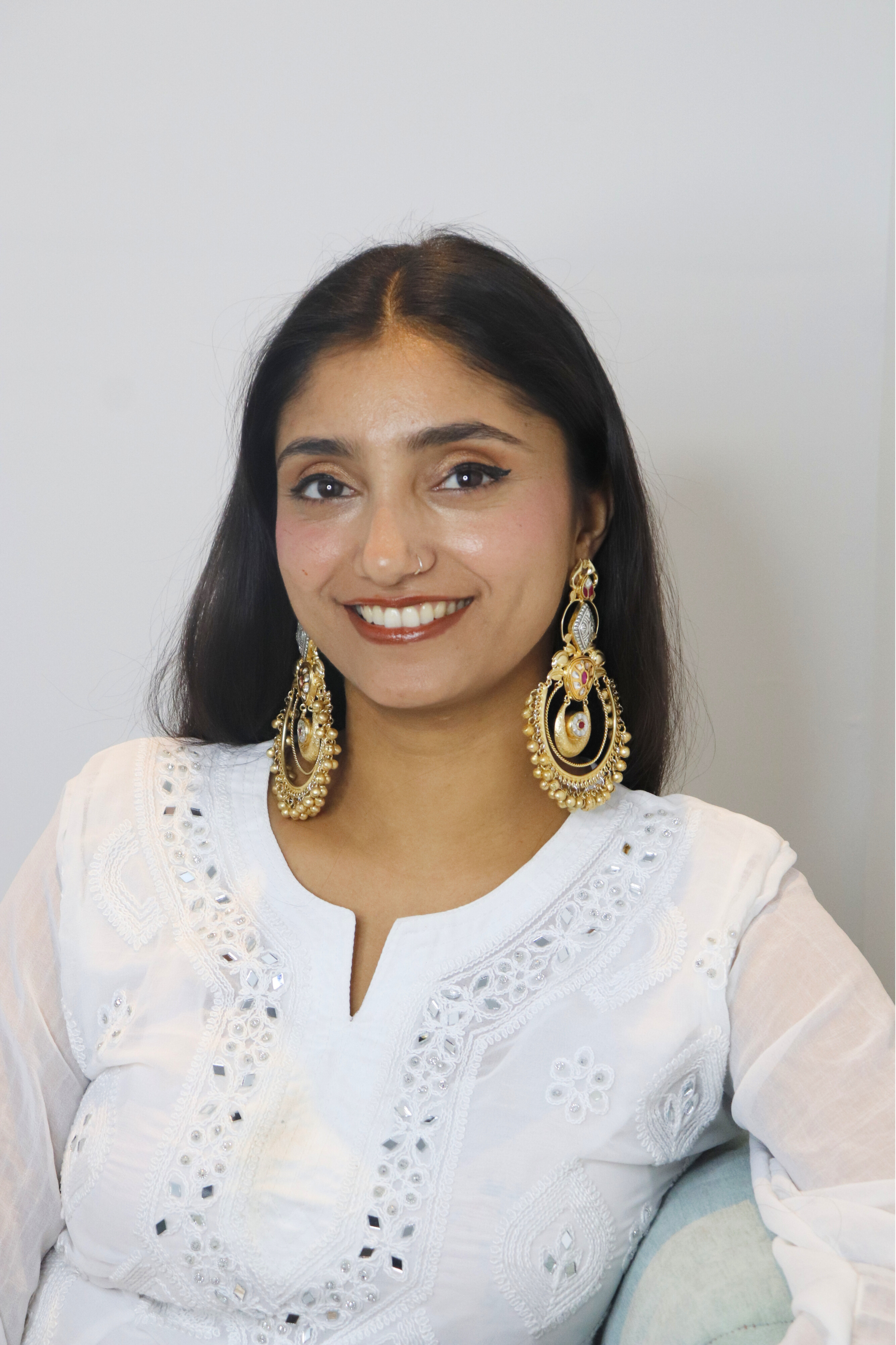 Woman wearing a gold earrings 